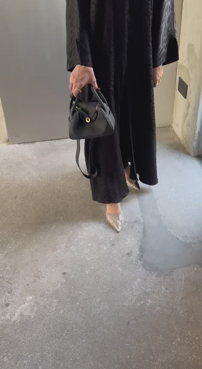 Clear UAE black Lindy shoulder bag detail view

