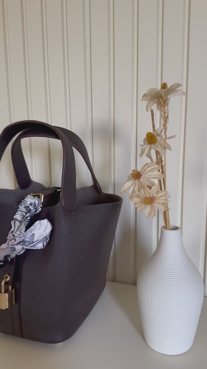 Clear UAE burgundy P bag front view
