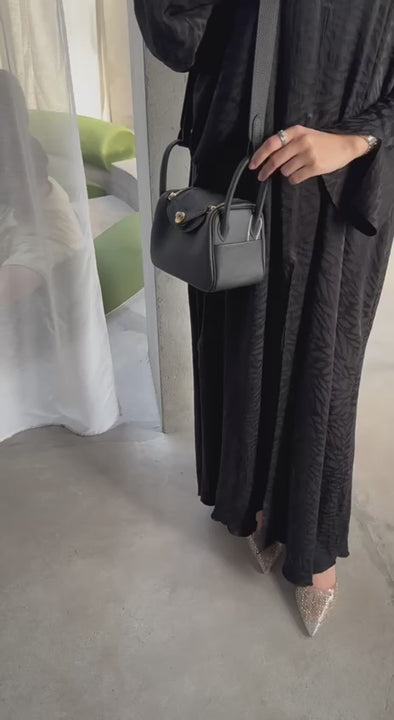 Clear UAE black Lindy shoulder bag detail view
